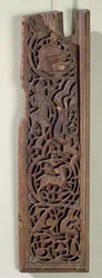 Carved panel decorated with a lute player