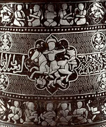Islamic Art: Silver and copper candlestick with a rider