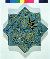 Star-shaped overglaze leaf-gilded tile in the style of Takht-e Solaiman