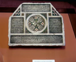 Tombstone with inscriptions in four languages