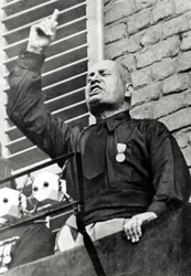 Mussolini in a black shirt