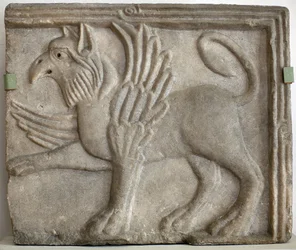Griffon (or gryphon). Low relief sculpted, marble, Venice (Italy) 12th century. National Gallery, Sternberg Palace, Prague (Czech Republic)
