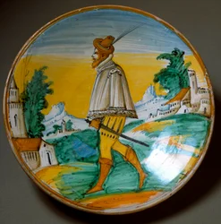 Young gun man. Ceramic plate produced in Viterbo, Italy. End of the 16th century