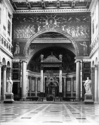 View of the high altar surmounted by a tabernacle by Arnolfo di Cambio (c.1245-1310) and with the tomb of St. Paul below