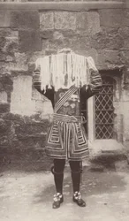 The Yeoman of the Guard carrying the silver dish with the purses containing the Maundy money