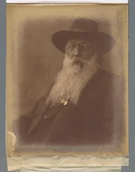 Portrait of a Man with Beard and Hat and a Cigar in His Mouth