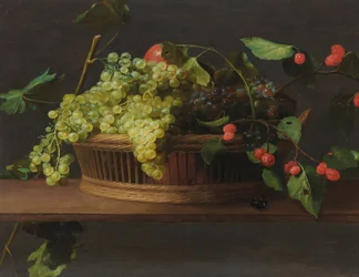 A basket of grapes and raspberries on a ledge
