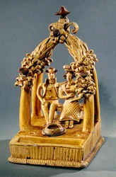 Writing set with a married couple seated under an arbour, Borne Workshop