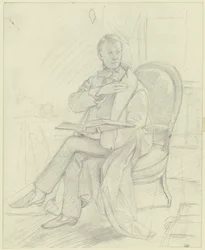 Young Man Sitting in an Armchair with a Book