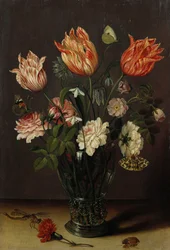 Tulips with Other Flowers in a Glass on a Table