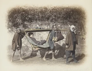 Woman carried in a kago