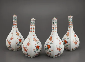 Four square bottles with lids