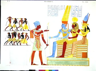 A Pharaoh in Military Costume Offers a Group of Prisoners to the Gods Amon, Khonsu, and Mut