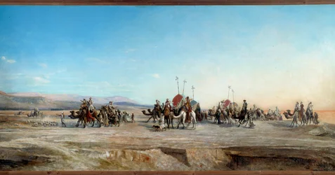 Looking for a camping caravans of nomads and camels in the desert