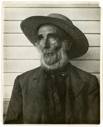 Old man in straw hat, c.1905-40
