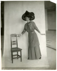 "Please be seated" Correct poise of legs, body arms and hands