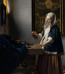 Woman Holding a Balance