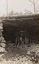 Shack with cannon (b/w photo)