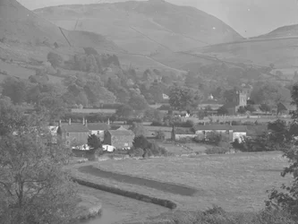 Orton Village buildings and church with fells behind