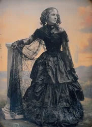 Woman in Black Taffeta Dress and Lace Shawl