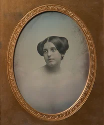 Young Woman with Hair Styled in Two Buns