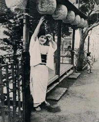 Sweet natured smile of tea-house maid, called nesan - elder sister