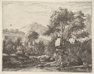 Two men standing ankle-deep in a body of water with a rocky outcrop behind them