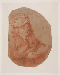 Young Man Reading with a Scarf Wrapped Around His Head