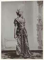 Portrait of a Javanese Woman Holding a Fan and Wearing a Crown