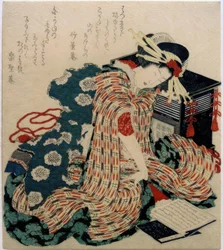Young Woman Reading “The Pillow Book”