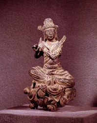 Korean art: representation of an Apsara in golden bronze, being Celeste. Silla period (7th-10th century). National Museum of Korea