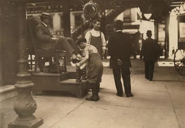 Bootblack at 3rd Avenue and 9th Street, New York City