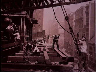 Empire State Building under construction, showing a lifting gang at work