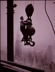 Empire State Building under construction, showing member of the derrick crew