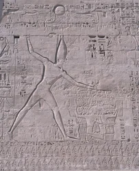 Carvings on the wall of a temple, Medinet Habu, Luxor, Egypt