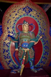 Statue of a warrior inside the wooden Pagoda of Yingxian near Datong, China