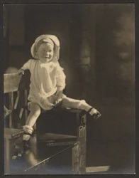 Baby Seated on Bench