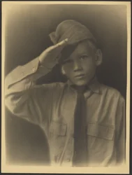 Boy Dressed as Soldier Saluting