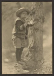 [Child Standing on Tree Root]
