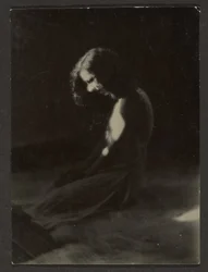 [Dancer Kneeling in Deep Shadow]