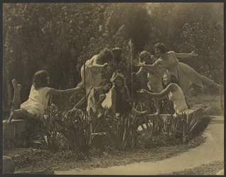 Dancers Posed Along Garden Wall