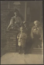 Family Portrait Outside House