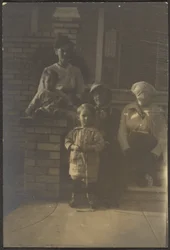 Family Portrait Outside House