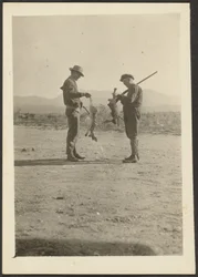 Fleckenstein and Man with Guns and Dead Jackrabbits