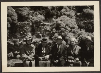Fleckenstein and Wife with Others on Park Bench