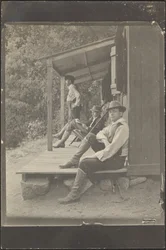 Men Sitting on a Porch
