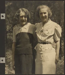 Portrait of Two Women Standing Outside