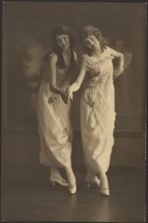 Portrait of Two Young Women in Matching Dresses