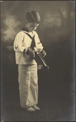 Portrait of a Boy in Sailor Suit with Toy Car