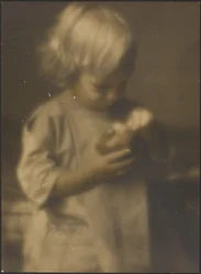 Portrait of a Child Holding an Apple